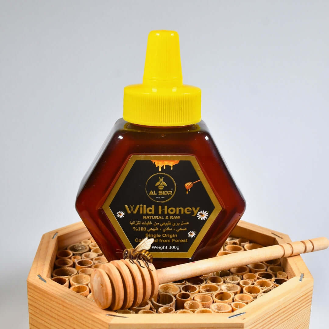 Wild Forest Honey 300g in honeycomb packaging, organic and natural honey from deep forests in UAE.